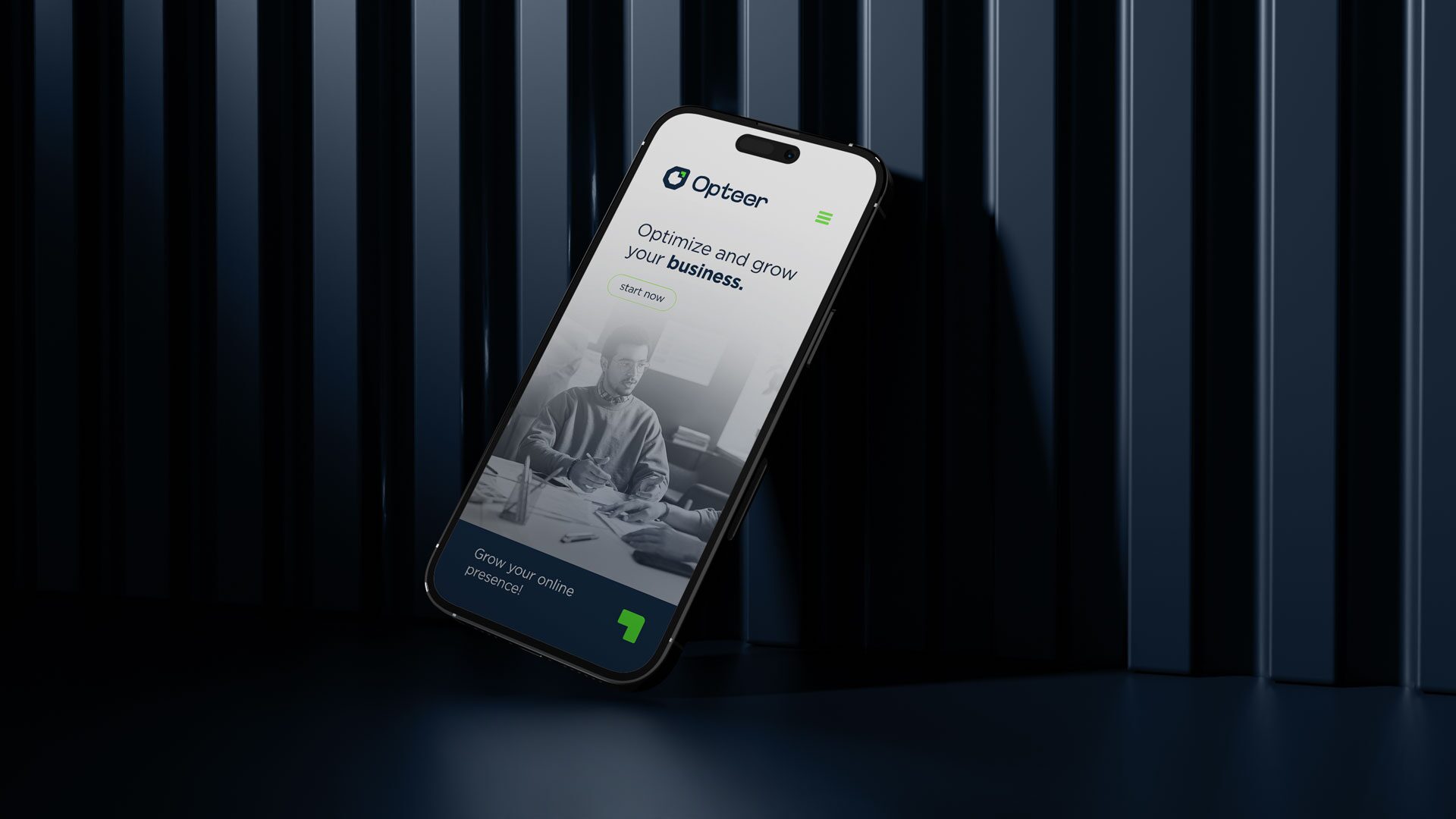 FIG.06 — a single phone leaning against a dark fluted wall, showing the Opteer splash screen