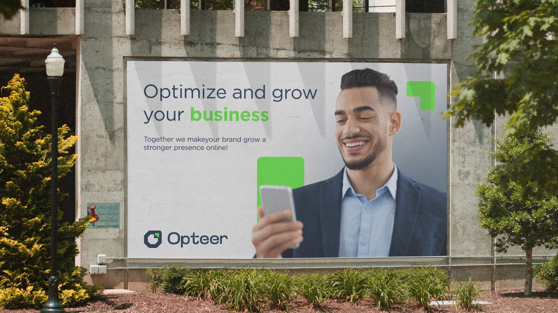 FIG.07 — a roadside Opteer billboard in daylight carrying the line Optimize and grow your business